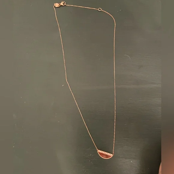 NWOT 14k rose gold and Diamond half moon pendant (.1ctw)